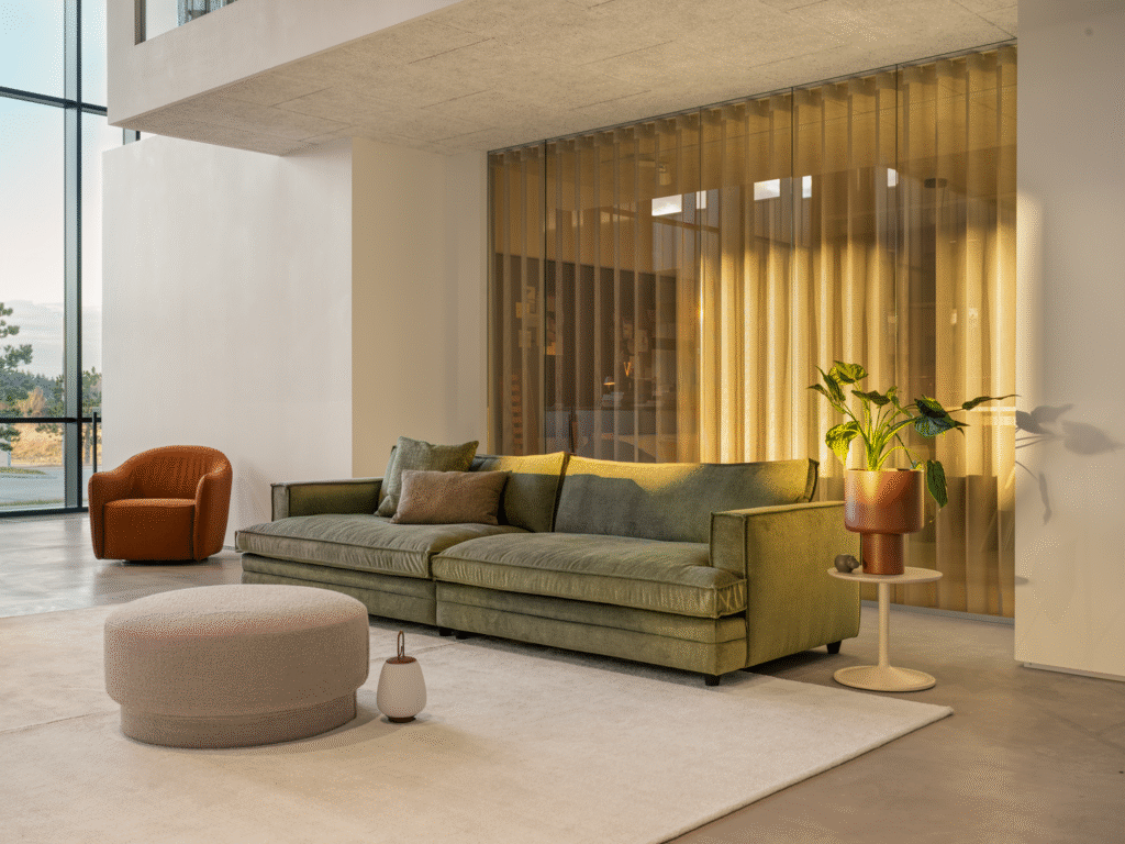 Green Velvet 4 seater Sofa in Modern interiors.